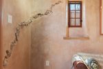Showcasing rock art and organic style of the home